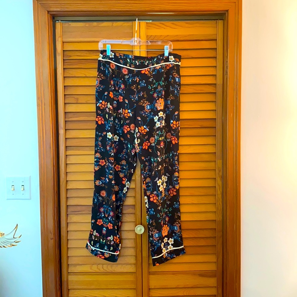 Floral pants with contrast piping.